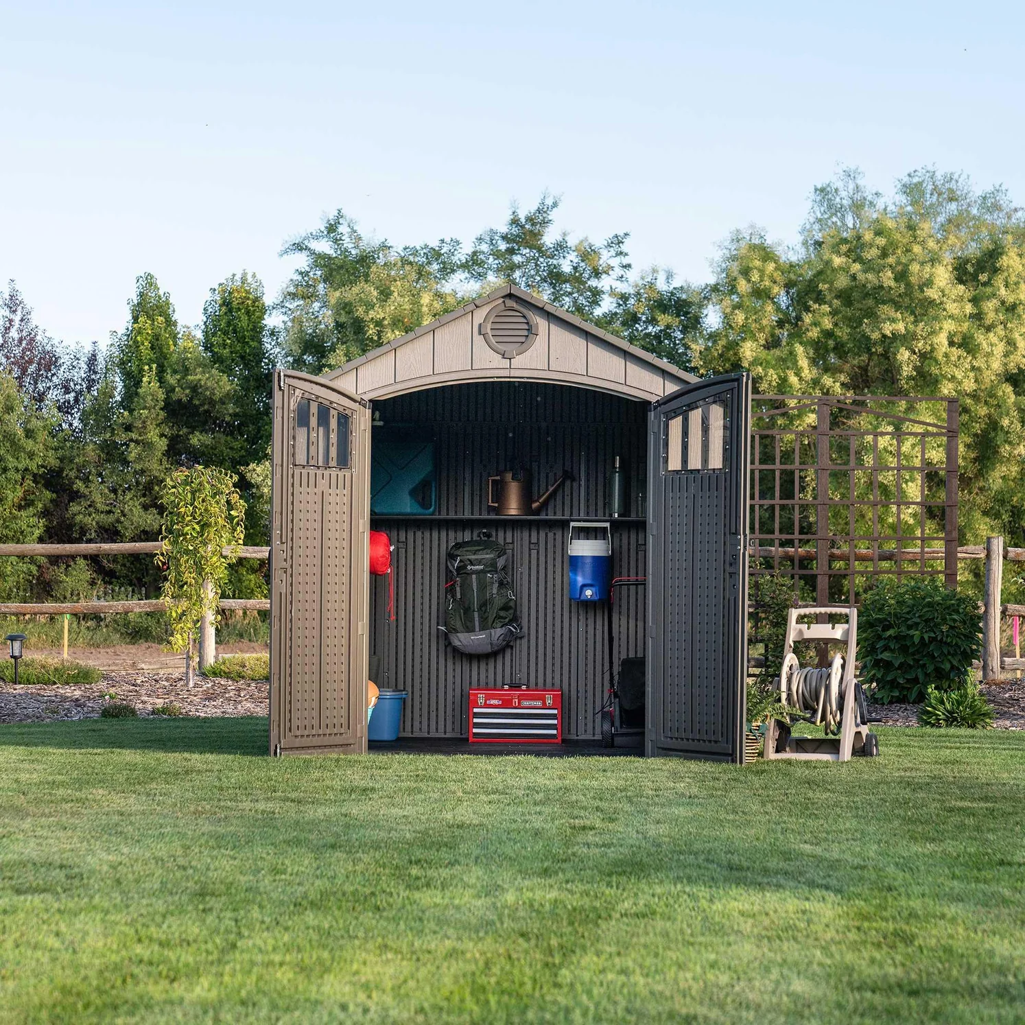 60370_Lifetime_8_Ft._X_7.5_Ft._Outdoor_Storage_Shed_-_placed_outside_with_doors_open_1494x1494